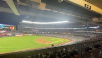 the yankees are playing a baseball game at yankee stadium