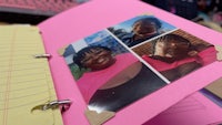 a pink notebook with photos of a woman